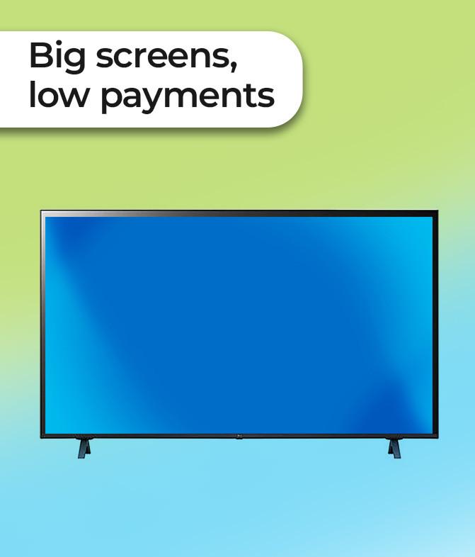 TV on tv stand and hand with remote.